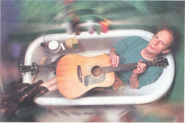 Joe Hall in bathtub - Cordova Bay Archives